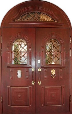 Стальная арочная дверь со стеклом и ковкой ДА-30 в дом из кирпича в Сочи
