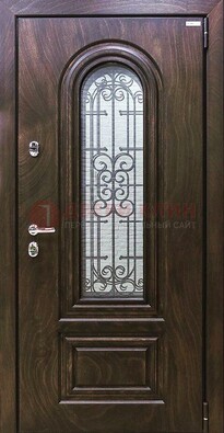 Темная филенчатая железная дверь со стеклом и ковкой ДСК-102 в Сочи